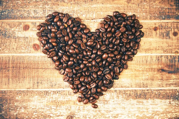 Corações de grãos de café — Fotografia de Stock