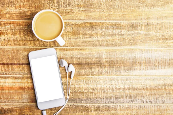 Coffee, phone and headphones — Stock Photo, Image