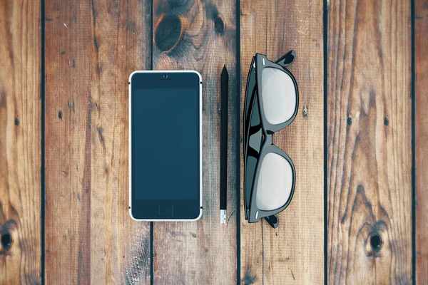 Gözlük ve boş telefon