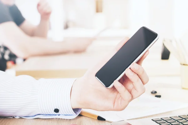 Hand holding phone — Stock Photo, Image