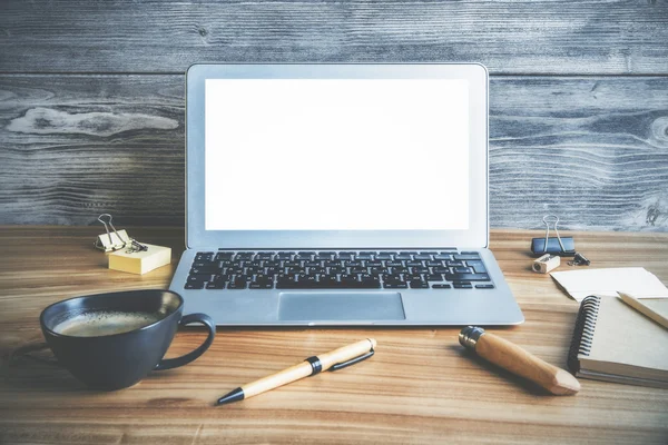 Laptop and coffee on wood — Stock Photo, Image