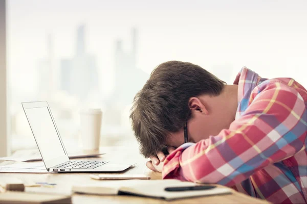 Exhausted male in office — Stock Photo, Image