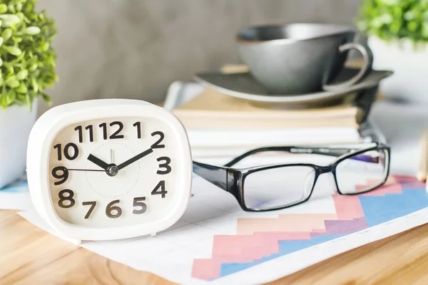 Glasses and white clock — Stock Photo, Image