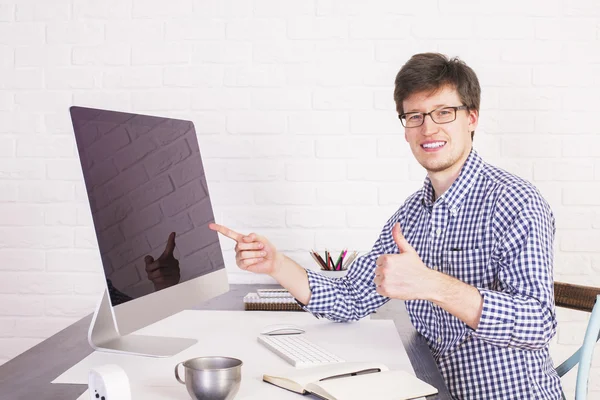 Pointing and showing thumbs up — Stock Photo, Image