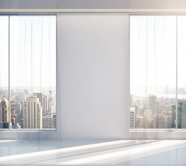 Blank wall in sunlit interior — Stock Photo, Image