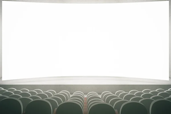 Серые сиденья в кино — стоковое фото