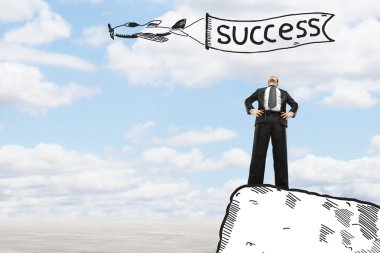 uçurumun kenarında duran işadamı