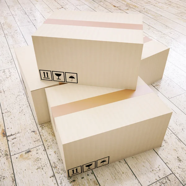 Cardboard boxes on floor — Stock Photo, Image