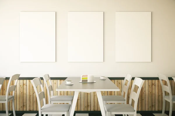 Cafe interior with three posters — Stock Photo, Image