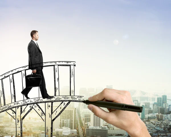 Success concept man on bridge — Stock Photo, Image