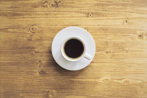 Kaffee auf dem Schreibtisch von oben — Stockfoto