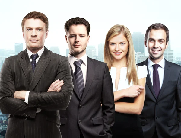 Partnership concept with attractive white businessmen and woman on city background — Stock Photo, Image