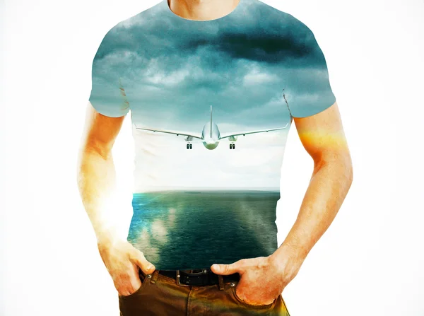 Man and flying plane in sky — Stock Photo, Image