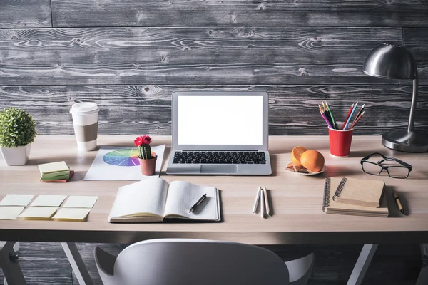 Desktop with white laptop front — Stock Photo, Image