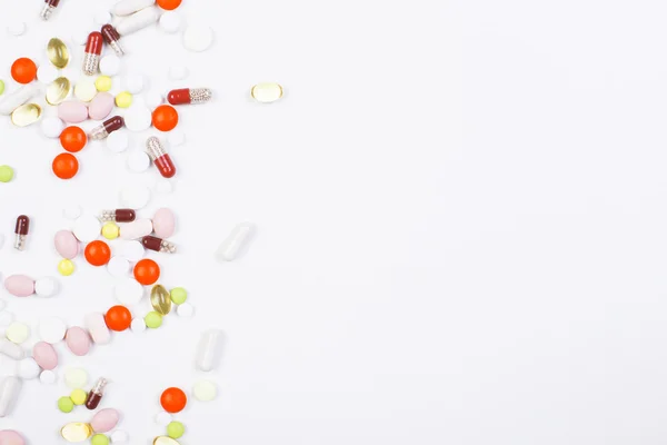 Colorful pills on blank surface — Stock Photo, Image