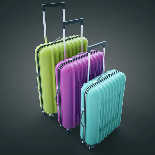 Красочные чемоданы на тёмном фоне — стоковое фото