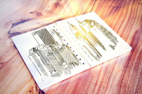 Construction sketch on wooden desk — Stock Photo, Image