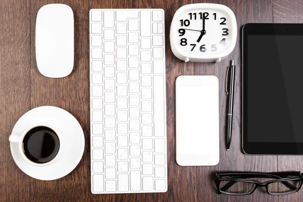 Electronic devices on wooden desktop — Stock Photo, Image