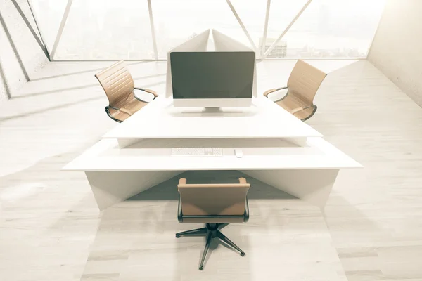 Blank computer on triangular table — Stock Photo, Image