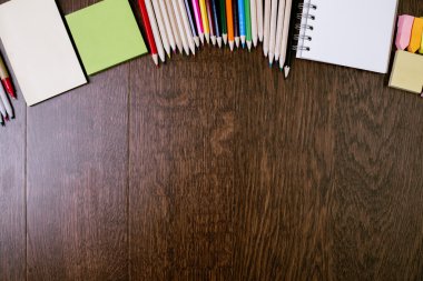 Wooden desktop with stationery items