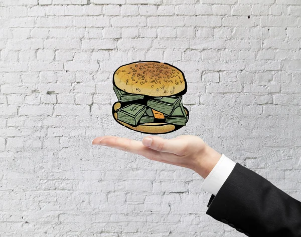 Zakenman Holding dollar burger — Stockfoto