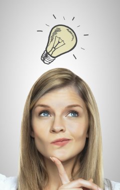 Woman with lightbulb above head