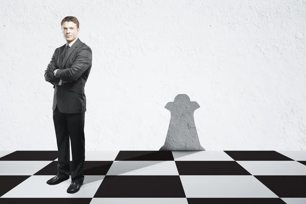 Businessman with chess queen shadow — Stock Photo, Image