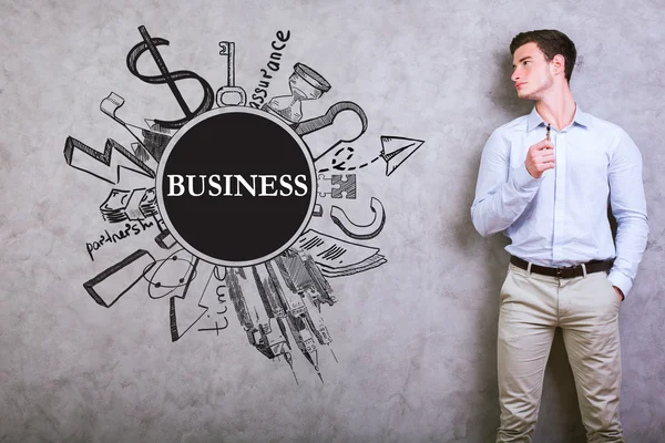 Young man with business sketch — Zdjęcie stockowe