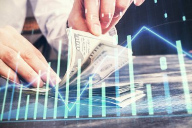 Forx grafiği, hologram, Amerikan dolarları ve insan eli çizimleri. Teknik Analiz kavramı.