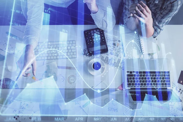 Double exposure of man and woman working together and financial graph hologram drawing. market analysis concept. Computer background. Top View. — Stock Photo, Image