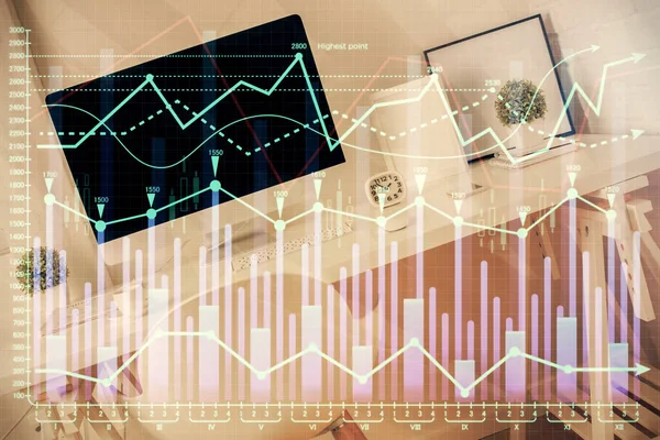 Double exposure of financial graph drawing and office interior background. Concept of stock market.