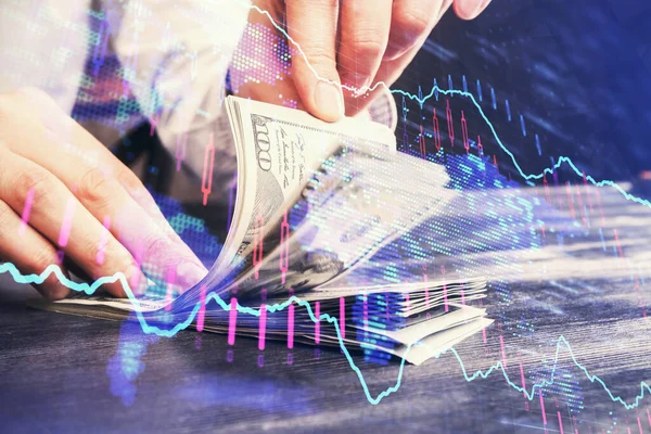 Multi blootstelling van forex grafiek tekenen hologram en Amerikaanse dollars biljetten en man handen. Technisch analyseconcept. — Stockfoto