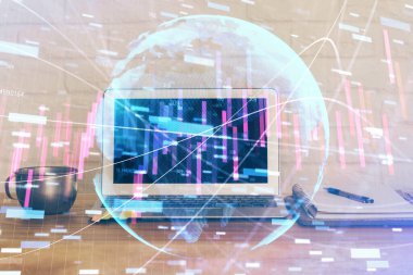 Finansal grafik renkli çizimler ve arka planda bilgisayar olan tablolar. Çifte maruziyet. Uluslararası pazarlar kavramı.