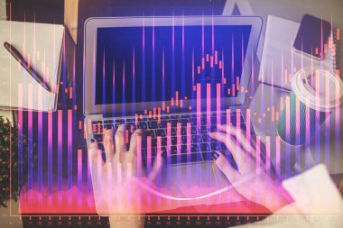 Bilgisayarda ve ön x grafik hologram çiziminde kadın eli yazarken çift pozlama. Borsa yatırım kavramı.