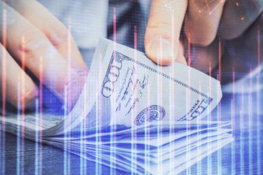 Forx grafiği, hologram, Amerikan dolarları ve insan eli çizimleri. Teknik Analiz kavramı.