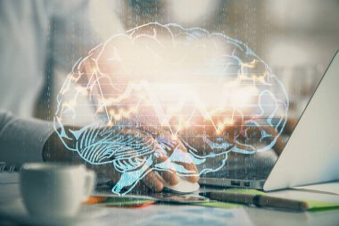 Adam klavyede beyin hologramıyla yazı yazıyor. Büyük Veri Kavramı.