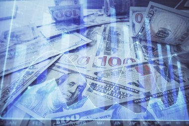 Forx grafiğinin çok sayıda görüntüsü bize dolar banknotları arka planında görünüyor. Finansal başarı piyasası kavramı.