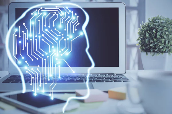 Double exposure of work space with computer and human brain drawing hologram. Brainstorm concept.