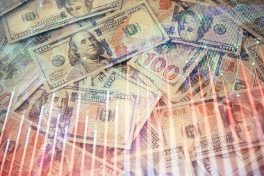 Forx grafiğinin çok sayıda görüntüsü bize dolar banknotları arka planında görünüyor. Finansal başarı piyasası kavramı.
