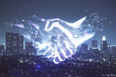Şehir manzarası arka planında el sıkışma hologramına çifte maruz kalma. Ortaklık kavramı.