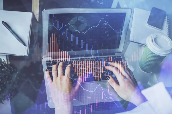 Double exposure of woman hands typing on computer and forex chart hologram drawing. Stock market invest concept. — Stock Photo, Image