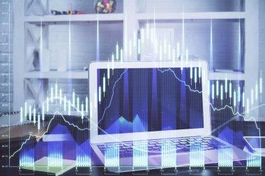 Arka planda eski pazar grafik hologramı ve kişisel bilgisayar var. Çifte maruziyet. Yatırım kavramı.