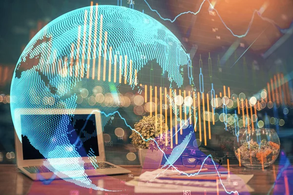 Double exposure of graph and financial info and work space with computer background. Concept of international online trading.