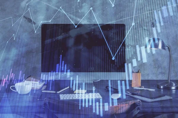 Financial graph colorful drawing and table with computer on background. Multi exposure. Concept of international markets.