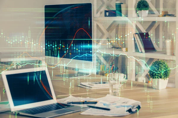 Double exposure of graph and financial info and work space with computer background. Concept of international online trading.