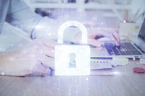 Double exposure of lock icon with man working on computer on background. Concept of network security.