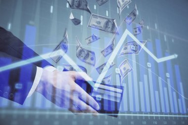 Finansal grafiğe çoklu pozlama hologram, Amerikan dolarları ve insan eli. Analiz kavramı.