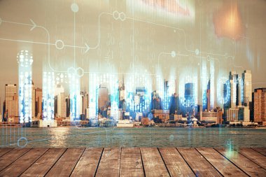 Veri temalı hologram gökdelenlerin arka planında çift pozlama ile şehir görünümüne çizim yapıyor. Teknoloji konsepti.