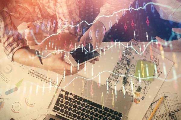 Double exposure of forex graph drawing and man and woman working together holding and using a mobile device. Trade concept. — Stock Photo, Image