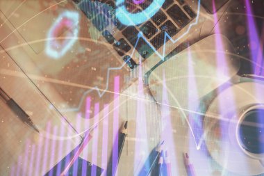 Bilgisayarla arka plan üzerine iki kat mali şema çizimi. Araştırma ve analiz kavramı. Üst görünüm.